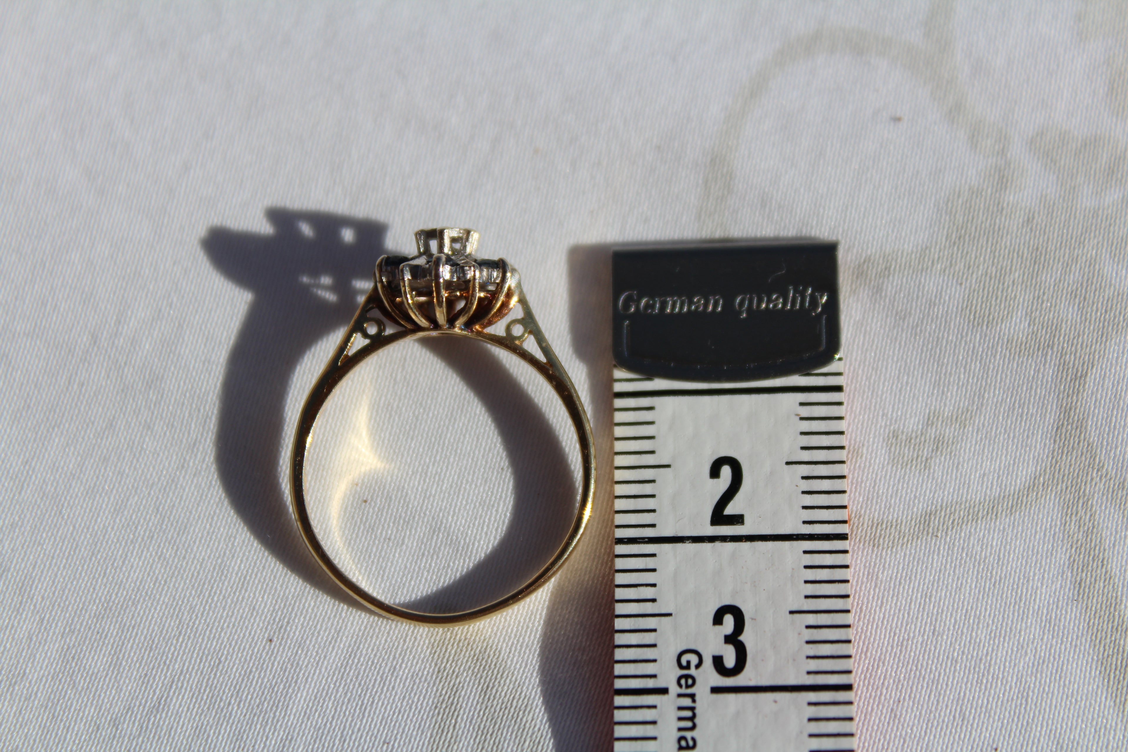 Antique Designer Ring with Sapphire and Diamond set in 18K Yellow Gold with Platinum Accents.