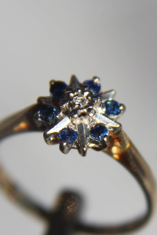 Antique Designer Ring with Sapphire and Diamond set in 18K Yellow Gold with Platinum Accents.