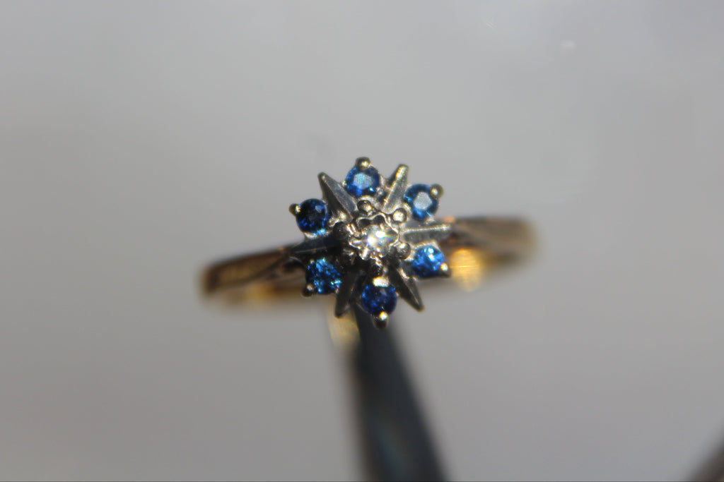 Antique Designer Ring with Sapphire and Diamond set in 18K Yellow Gold with Platinum Accents.