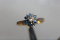 Antique Designer Ring with Sapphire and Diamond set in 18K Yellow Gold with Platinum Accents.