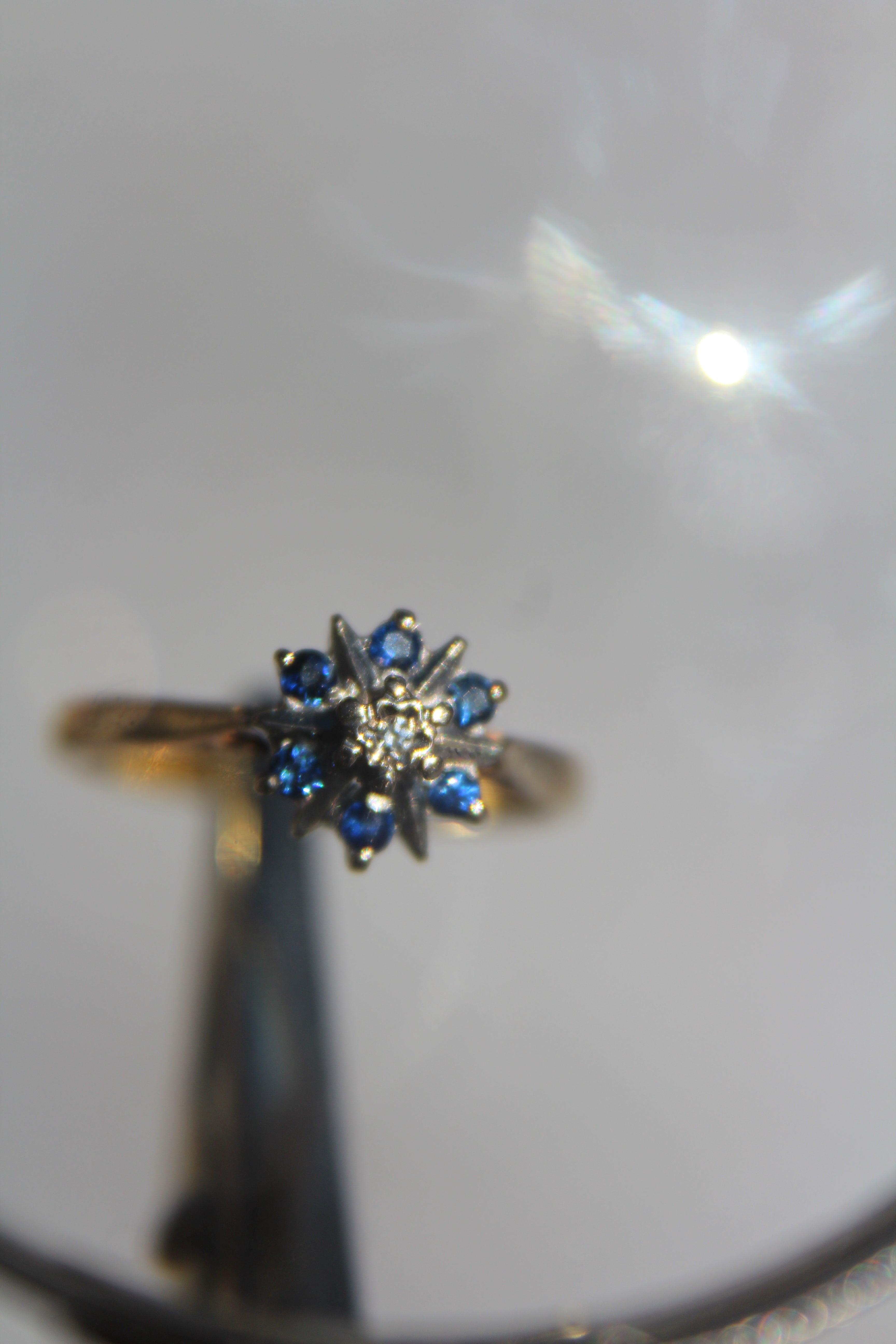 Antique Designer Ring with Sapphire and Diamond set in 18K Yellow Gold with Platinum Accents.