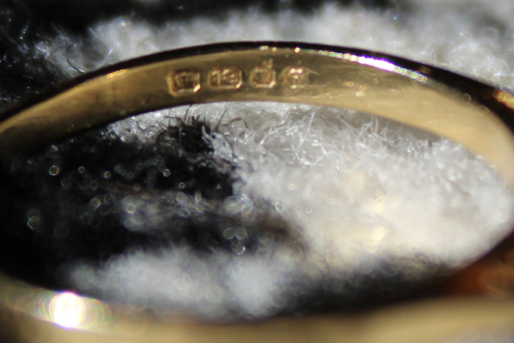 Antique Designer Ring with Sapphire and Diamond set in 18K Yellow Gold with Platinum Accents.