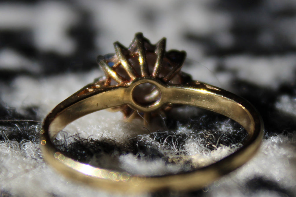 Antique Designer Ring with Sapphire and Diamond set in 18K Yellow Gold with Platinum Accents.